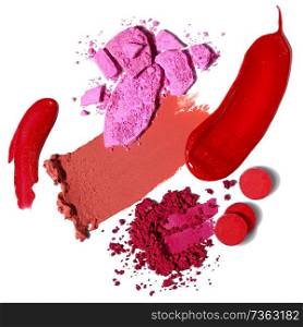 Creative concept photo of cosmetics swatches beauty products lipstick lip gloss eyeshadow on white background.