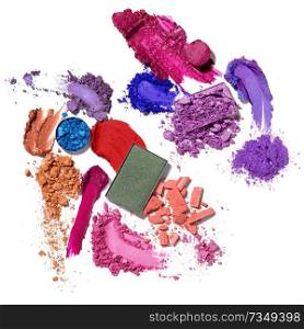 Creative concept photo of cosmetics swatches beauty products lipstick square and round eyeshadow on white background.