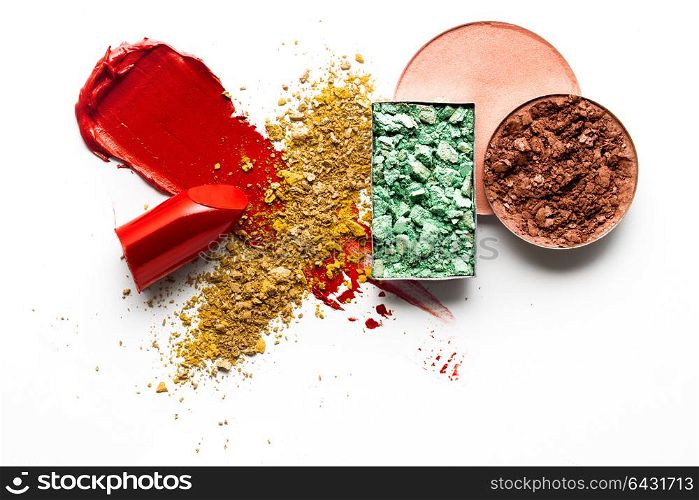 Creative concept photo of cosmetics swatches on white background.