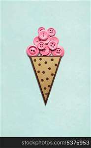 Creative concept photo of ice cream with buttons made of paper on mint background.