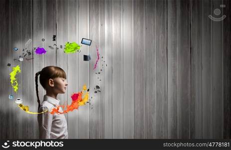 Creative concept. Side view of cute girl with closed eyes and colorful splashes