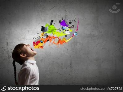 Creative concept. Side view of cute screaming girl and colorful splashes