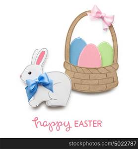 Creative easter concept photo of a rabbit with eggs in a basket made of paper on white background.