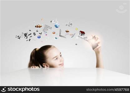 Creative education. Little cute girl and flying above icons