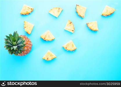Creative exotic fruit design, Pineapple slice on blue color background