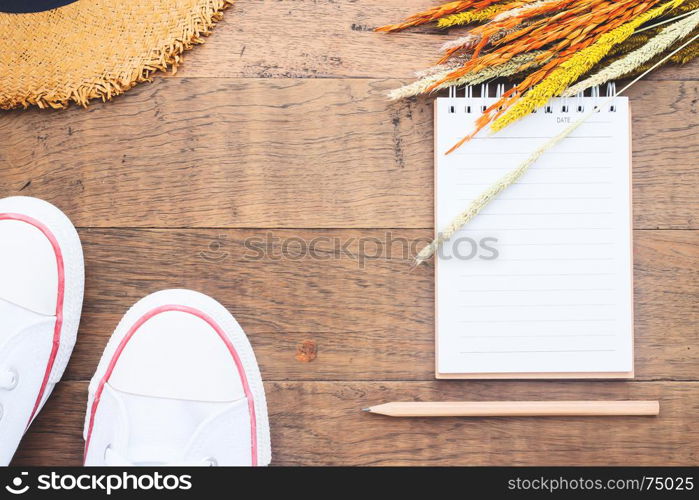 Creative flat lay of blank notebook and pencil on wooden background, Autumn lifestyle