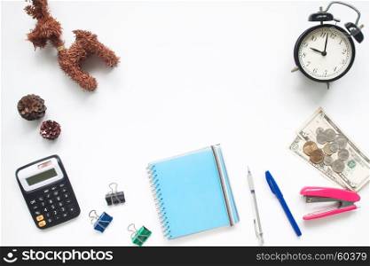 Creative flat lay of school supplies on white background with copy space