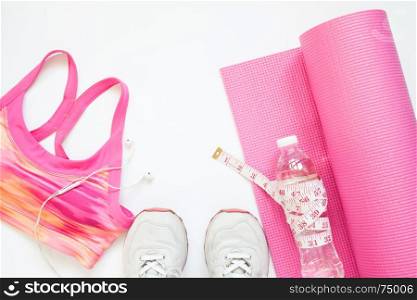 Creative flat lay of sport equipments in pink collection, Gym and workout