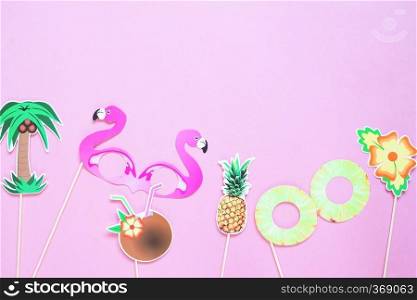 Creative flat lay of summer concept on pink colour background