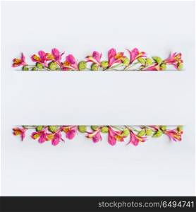 Creative floral design frame, border or banner layout with pink and green exotic flowers on white background, top view