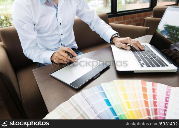 creative Graphic designer job with colour charts at a modern office