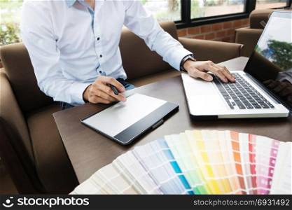 creative Graphic designer job with colour charts at a modern office