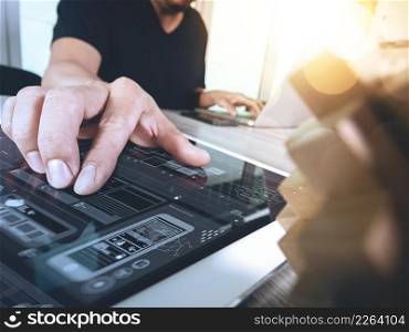 creative hand showing wood puzzle and smart phone with laptop computer and tablet computer as design concept