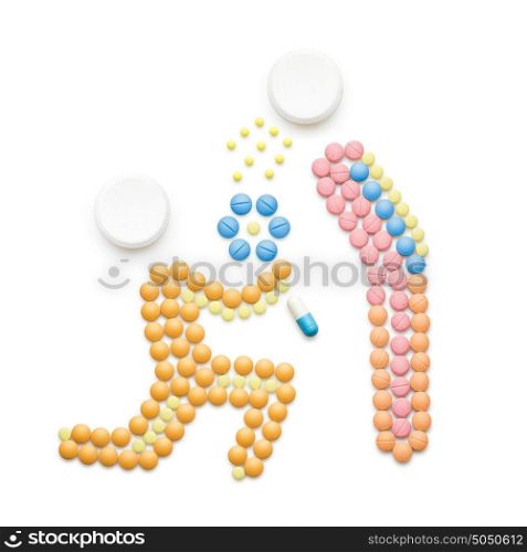 Creative health concept made of drugs and pills, isolated on white. A person that caught a cold, sneezing and spreading disease on a love partner.