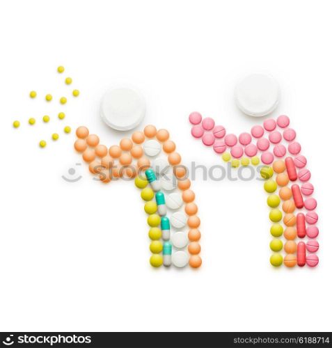 Creative health concept made of drugs and pills, isolated on white. A person that caught a cold, sneezing and spreading disease while standing near another person.