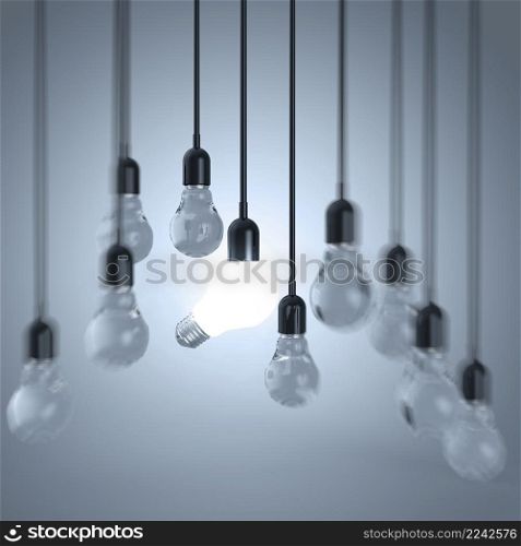 creative idea and leadership concept light bulb on grey background