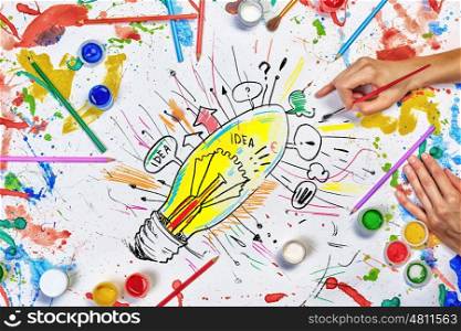 Creative idea work. Top view of people hands drawing business creative concept with paints