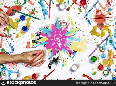 Creative idea work. Top view of people hands drawing business creative concept with paints