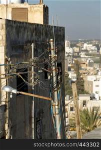 Creative laying of above-ground electrical cables in Madaba, jordan