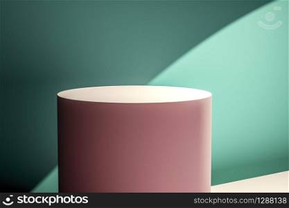 Creative layout made of pink circular product stand against a green wall in a shaft of sunlight creating a mix of perspectives and shadows for a design template. Minimal concept with copy space.