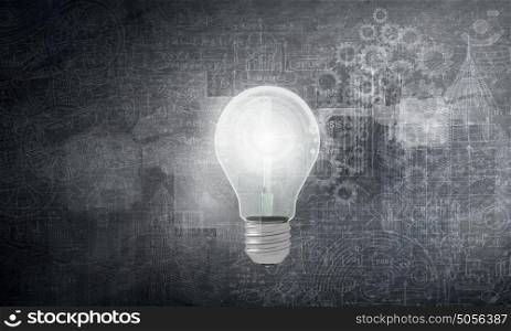 Creative light bulb with drawn charts and graphs . Business success strategy plan