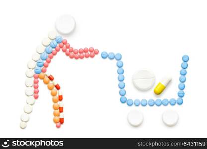 Creative medicine and healthcare concept made of pills, drugs in shopping cart, isolated on white.