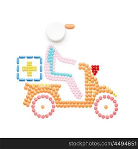 Creative medicine and healthcare concept made of pills, drugs motorbike delivery, isolated on white.