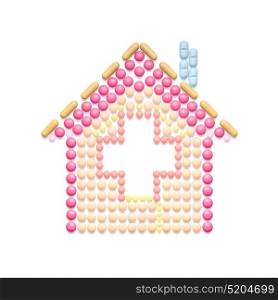 Creative medicine and healthcare concept made of pills in the shape of a house on white background.