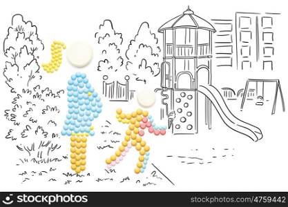 Creative medicine and healthcare concept made of pills, pregnant woman walking in the park with another child, on sketchy background.