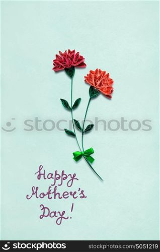 Creative mother day concept photo of flowers made of paper on int background.