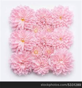 Creative Pastel pink flowers flat lay, top view, vertical. Layout or greeting card for Mothers day, wedding or happy event
