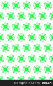 Creative pattern from drink splashes in the form of shamrock&rsquo;s plant with four petals on a white background. Happy St.Patrick &rsquo;s Day concept.. Vertical holiday pattern from splashes of clover leaves.