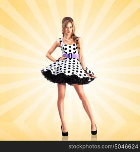 Creative photo of a vogue pin-up girl, dressed in a retro polka-dot dress, posing on colorful abstract cartoon style background.