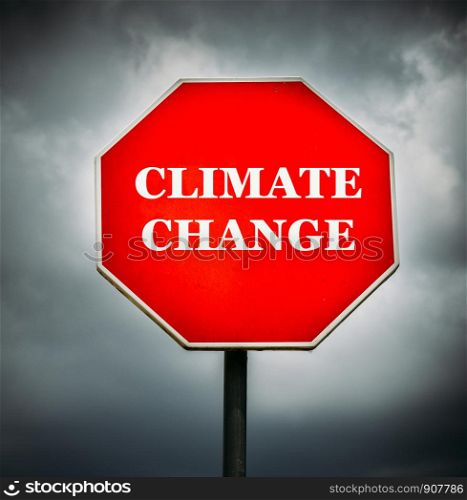 Creative Sign-Stop Climate Change with dark clouds.. Creative Sign-Stop Climate Change with dark clouds