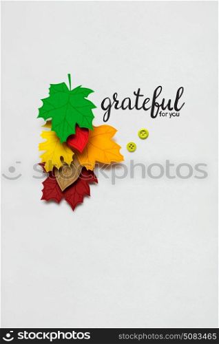Creative thanksgiving day concept photo of leaves made of paper on white background.