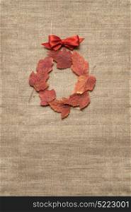 Creative thanksgiving day concept photo of leaves on brown background.