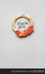 Creative thanksgiving day concept photo of leaves on grey background.