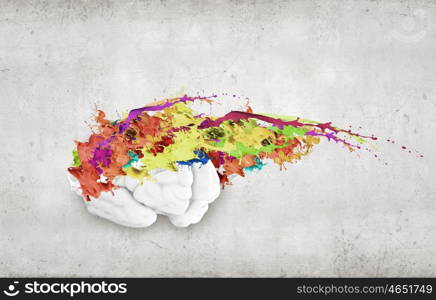 Creative thinking. Conceptual image of human brain in colorful splashes