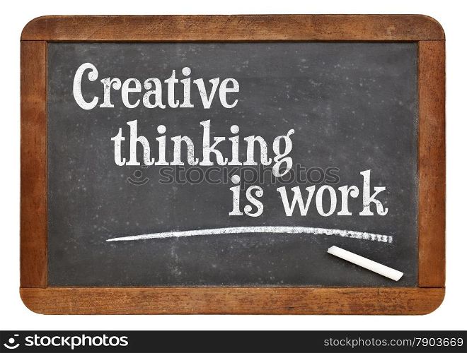 Creative thinking is work - creativity concept - text on a vintage slate blackboard