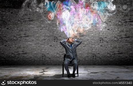 Creative thinking. Young businessman thinking over the ideas. Creativity concept