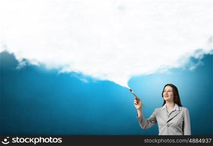 Creative thinking. Young pretty businesswoman holding paint brush. Creativity concept