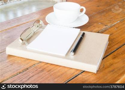 Creative time with cup of coffee and book, stock photo