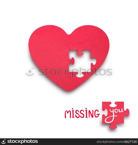 Creative valentines concept photo of a heart with a piece of puzzle on white background.