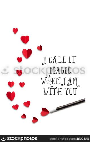 Creative valentines concept photo of a magic wand with hearts on white background.