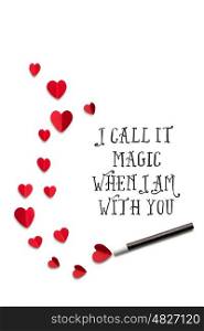 Creative valentines concept photo of a magic wand with hearts on white background.