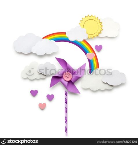 Creative valentines concept photo of a wind mill toy clouds and hearts made of paper on white background.