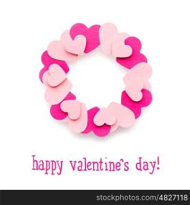 Creative valentines concept photo of a wreath made of paper hearts on white backgound.