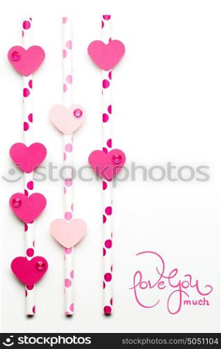 Creative valentines concept photo of hearts made of paper and cocktail straws on white background.
