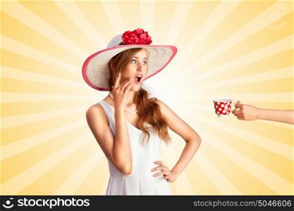 Creative vintage photo of a shocked pin-up girl who is treated with polka dot cup of hot tea or coffee on colorful abstract cartoon style background.
