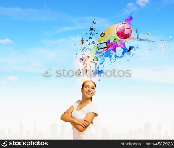 Creativity concept. Young smiling woman with colorful thoughts above head